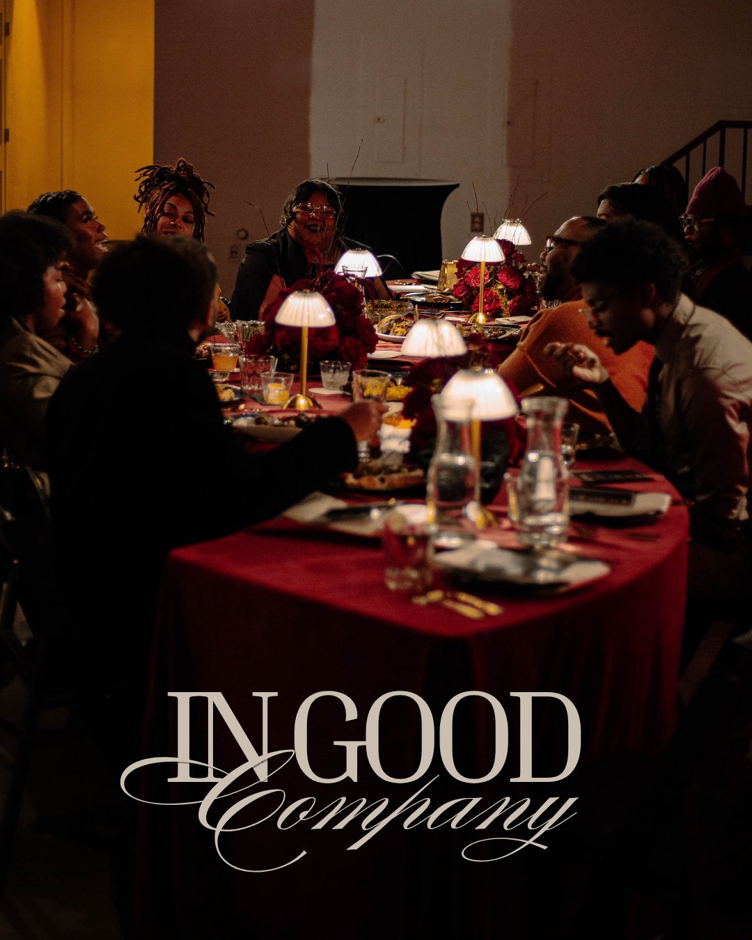 The long table under lamplight at In Good Company